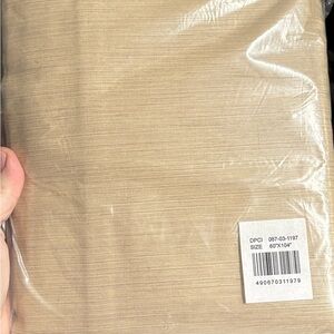 Target 60x104 Tablecloth in a yellowish tan color